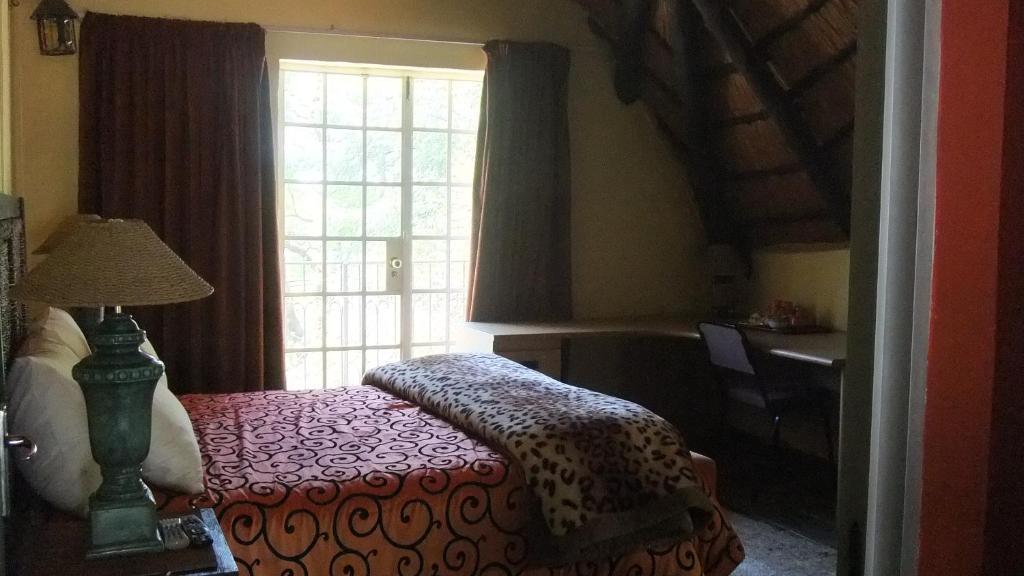 Treetops & Treats Guest House Pretoria-Noord Habitación foto